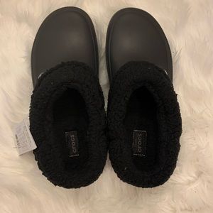 Black brand new crocs with tags M9/W11. Classic blitzed III clog . Never worn.